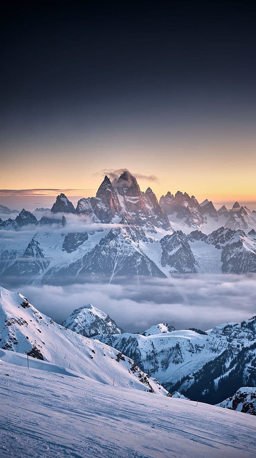Twilight Over Snowy Peaks